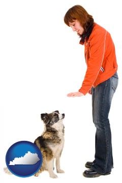 a woman training a pet dog - with Kentucky icon